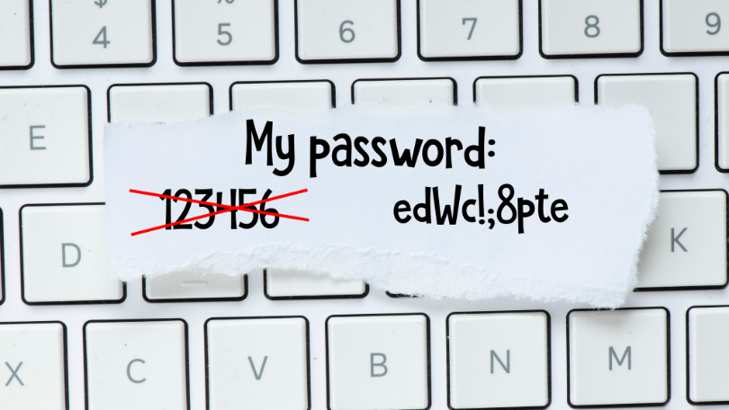 A piece of paper on a keyboard showing a weak password “123456” crossed out and replaced with a strong password “edWc!;8pte”, highlighting the importance of secure passwords in basic cyber security for small businesses.